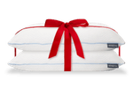 two cloud adjustable pillows with a bow on top