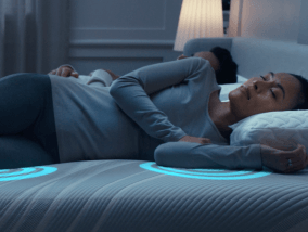 Woman lying on mattress with pressure support emphasized