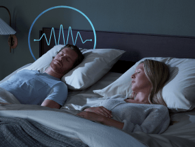 Two people sleeping with a snore response icon featured
