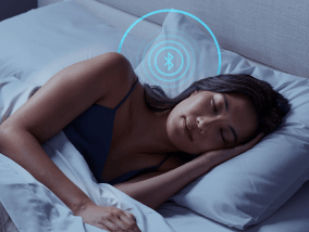 Woman sleeping on side with Bluetooth icon featured