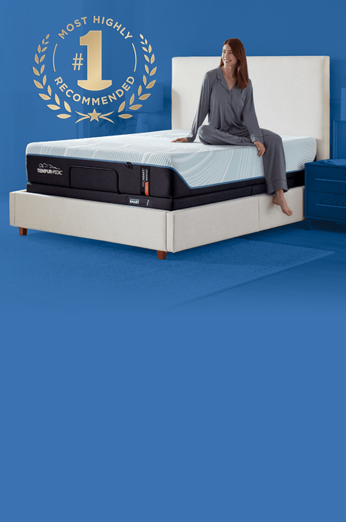 Woman sitting on a LuxeBreeze mattress