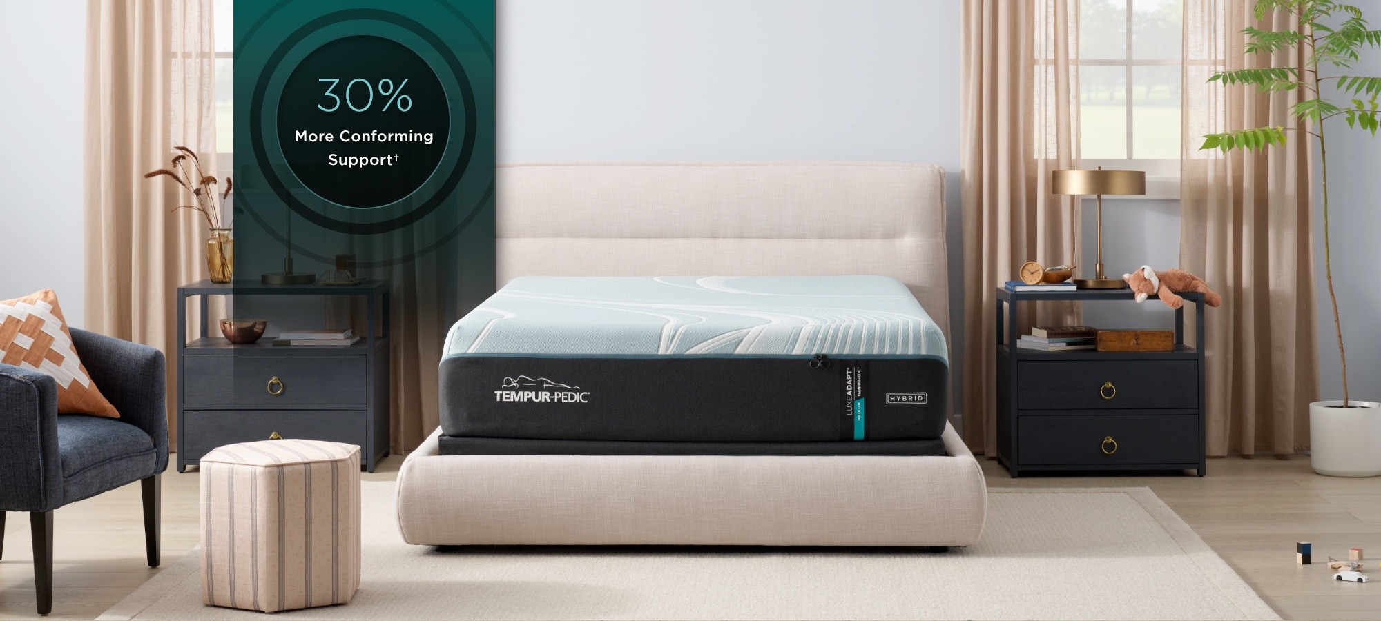 LuxeAdapt Medium Hybrid mattress in a styled room 30% more conforming support