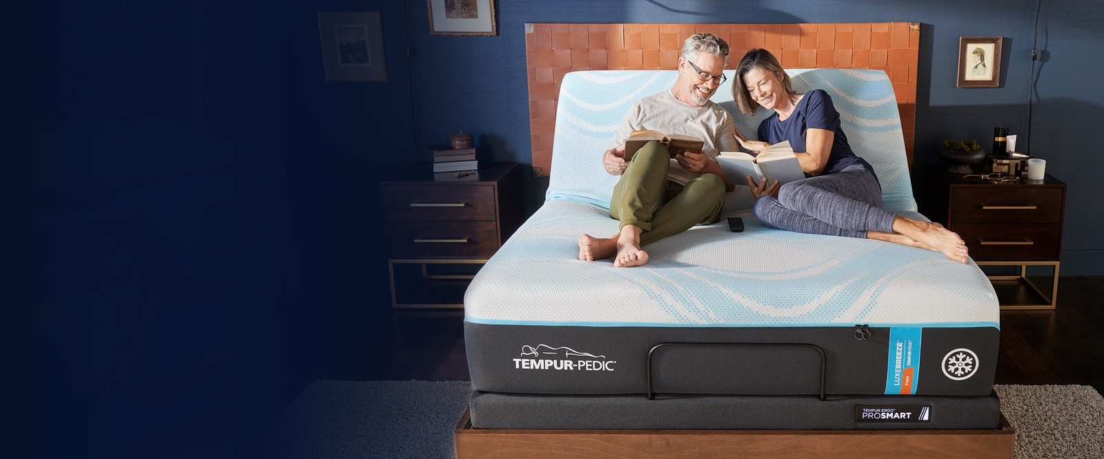 Couple sitting on LuxeBreeze with ProSmart base