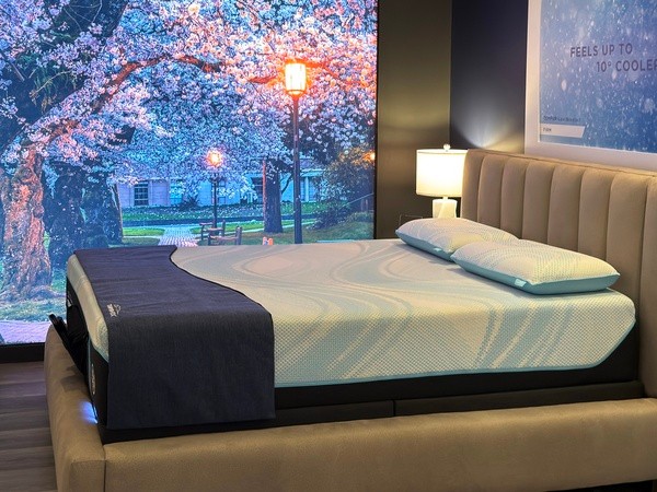 A Tempur-Pedic Retail Showroom Sleep Pod with an Image of Cherry Blossoms in the Background