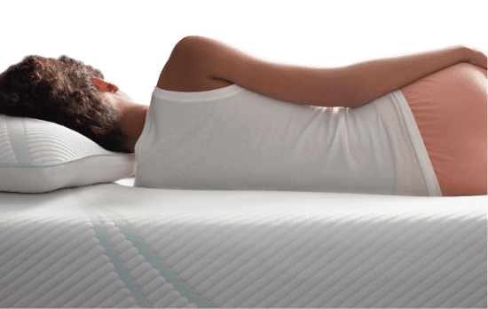 Profile of Woman Lying on Her Body-Adapting Tempur-Pedic