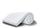 A rolled up tempur-topper supreme