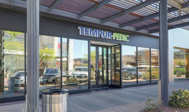 Tempur-Pedic flagship store-front showing large glass windows dispalying Tempur-Pedic mattresses inside