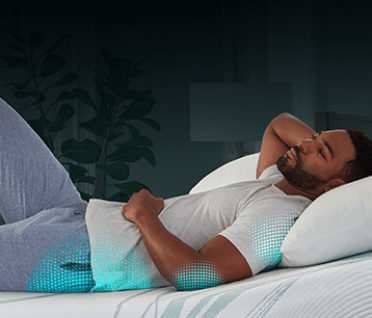 Man lying on mattress with pressure support emphasized