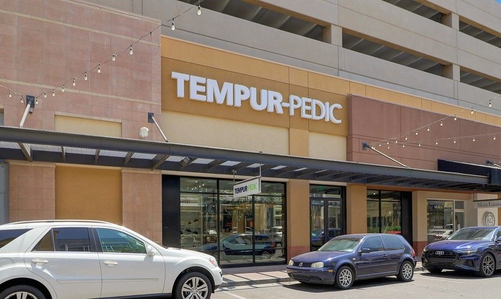 Tempur-Pedic flagship store-front showing large glass windows dispalying Tempur-Pedic mattresses inside