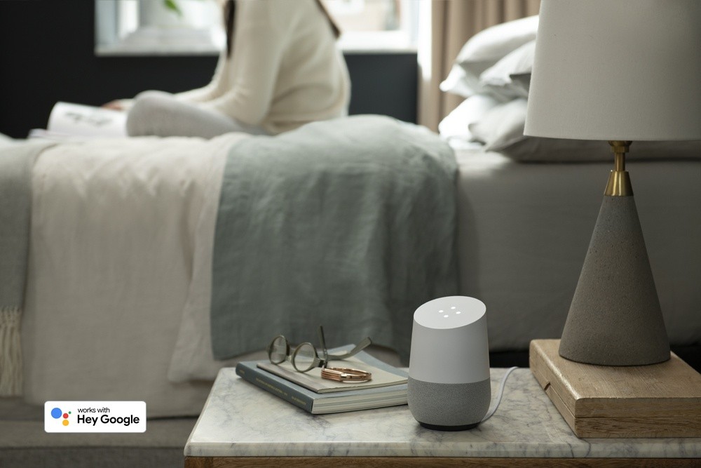 A google assistant on a night stand